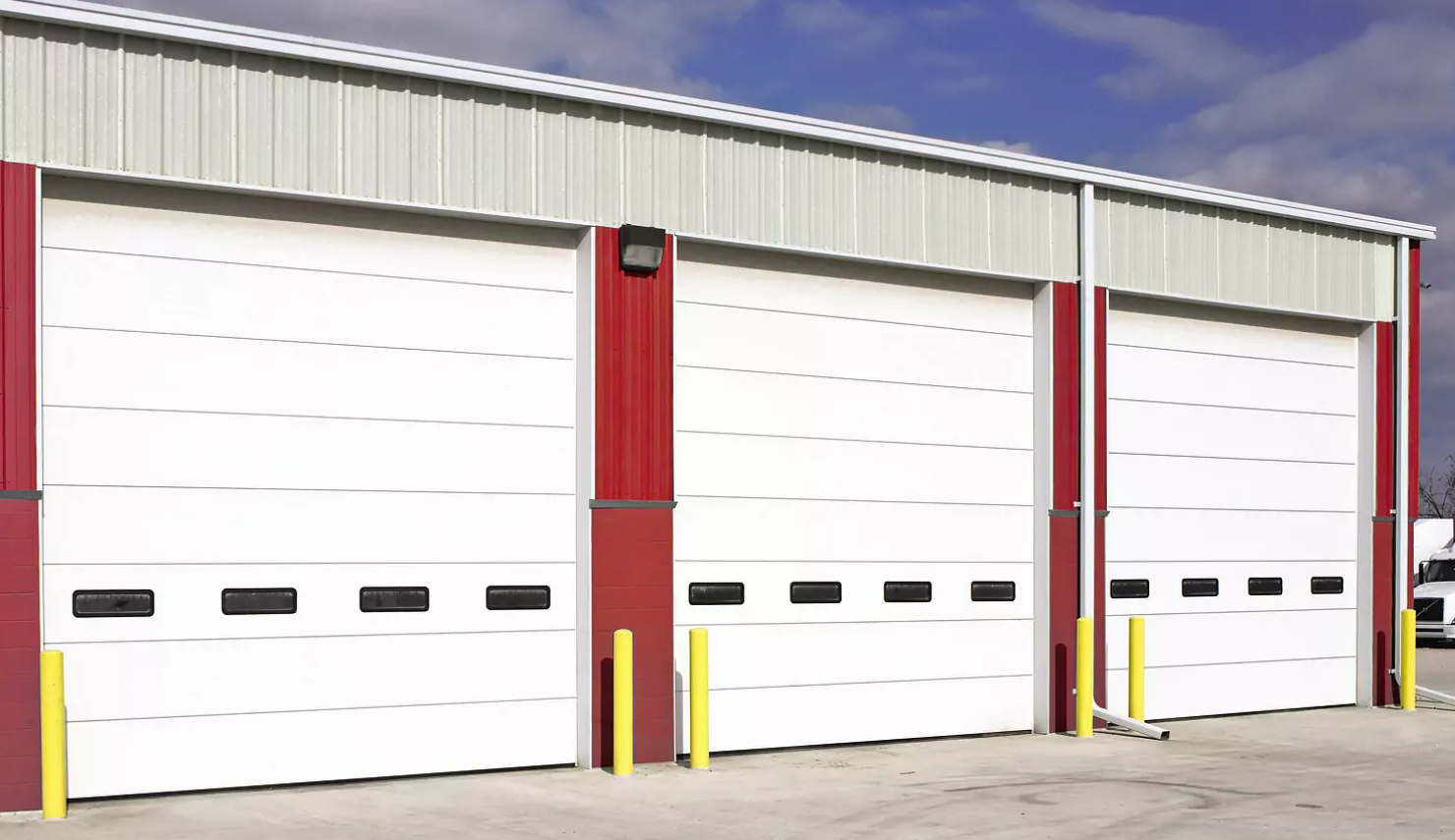 a durable commercial garage door being installed in Cloud, FL, showcasing professional services for businesses.