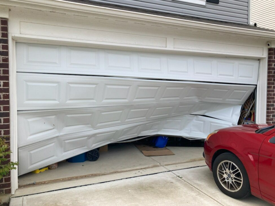 a technician performing a garage door replacement, highlighting the process of installing a new door to enhance the security and functionality of a residential garage in Florida.